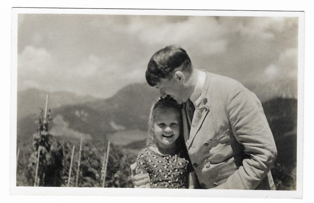 Adolf Hitler with young girl, Rosa Bernile Nienau, on the Obersalzberg.