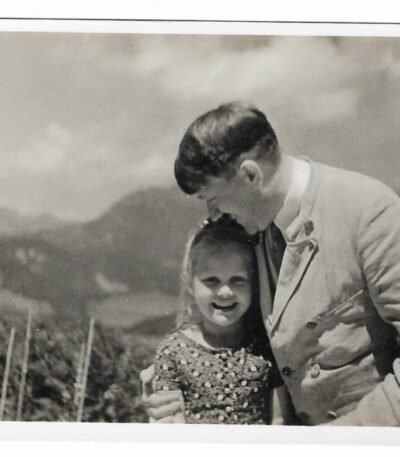 Adolf Hitler with young girl, Rosa Bernile Nienau, on the Obersalzberg.