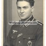 Wehrmacht Unteroffizier wearing the Infanteriesturmabzeichen and Verwundetenabzeichen