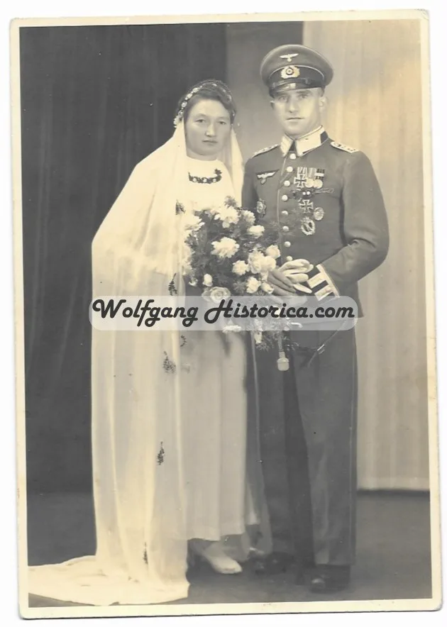 Wehrmacht Feldwebel wearing the German Cross in Gold and many other Awards - Image 1