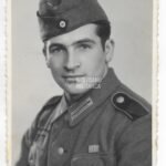 Studioportrait of a Wehrmacht Soldier wearing the Allgemeines-Sturmabzeichen