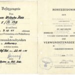 2x Award Docs: Verwundetenabzeichen in Schwarz & Gold (!) - Pionier-Bataillon 158 & Brücken-Staffel 936