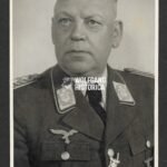 Portrait of General der Flieger Ernst Müller wearing the Deutsches Kreuz in Silber - Feldjägerkommando I (!)