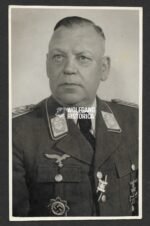 Portrait of General der Flieger Ernst Müller wearing the Deutsches Kreuz in Silber - Feldjägerkommando I (!)