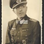 Portrait of Wehrmacht Oberleutnant wearing Deutsches Kreuz in Gold, Nahkampfspagne & Krimschild