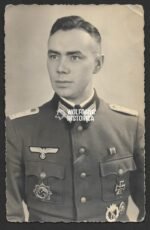 Portrait of Wehrmacht Hauptmann wearing Deutsches Kreuz in Gold