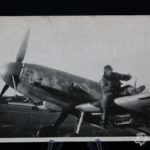 Photo of Luftwaffe Pilot sitting on wing of Me 109 in Stralsund