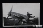 Photo of Luftwaffe Pilot sitting on wing of Me 109 in Stralsund