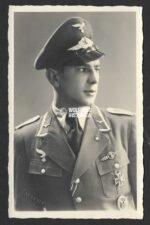 Studioportrait of Luftwaffe Aufklärer with Awards & Unit/Unknown Pin on his collar!