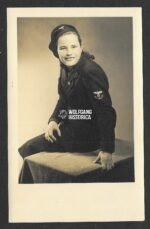 Studioportrait of young girl with the Reichspost