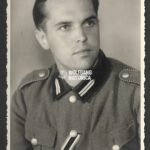 Studioportrait of Reichsarbeidsdienst member showcasing his KVK2X!