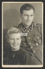 Studioportrait of Waffen-SS NCO with awards