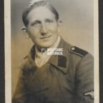 Studioportrait of a Waffen-SS soldier in StuG Uniform