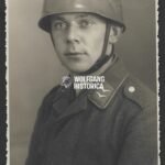 Studioportrait of Fallschirmjäger - "Südfront" FJ Helmet