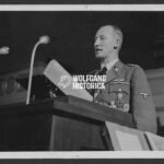 Press Photo: SS-Obergruppenführer Reinhard Heydrich speaking at a Conference