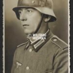 Studioportrait Wehrmacht Soldier wearing helmet (with decal)