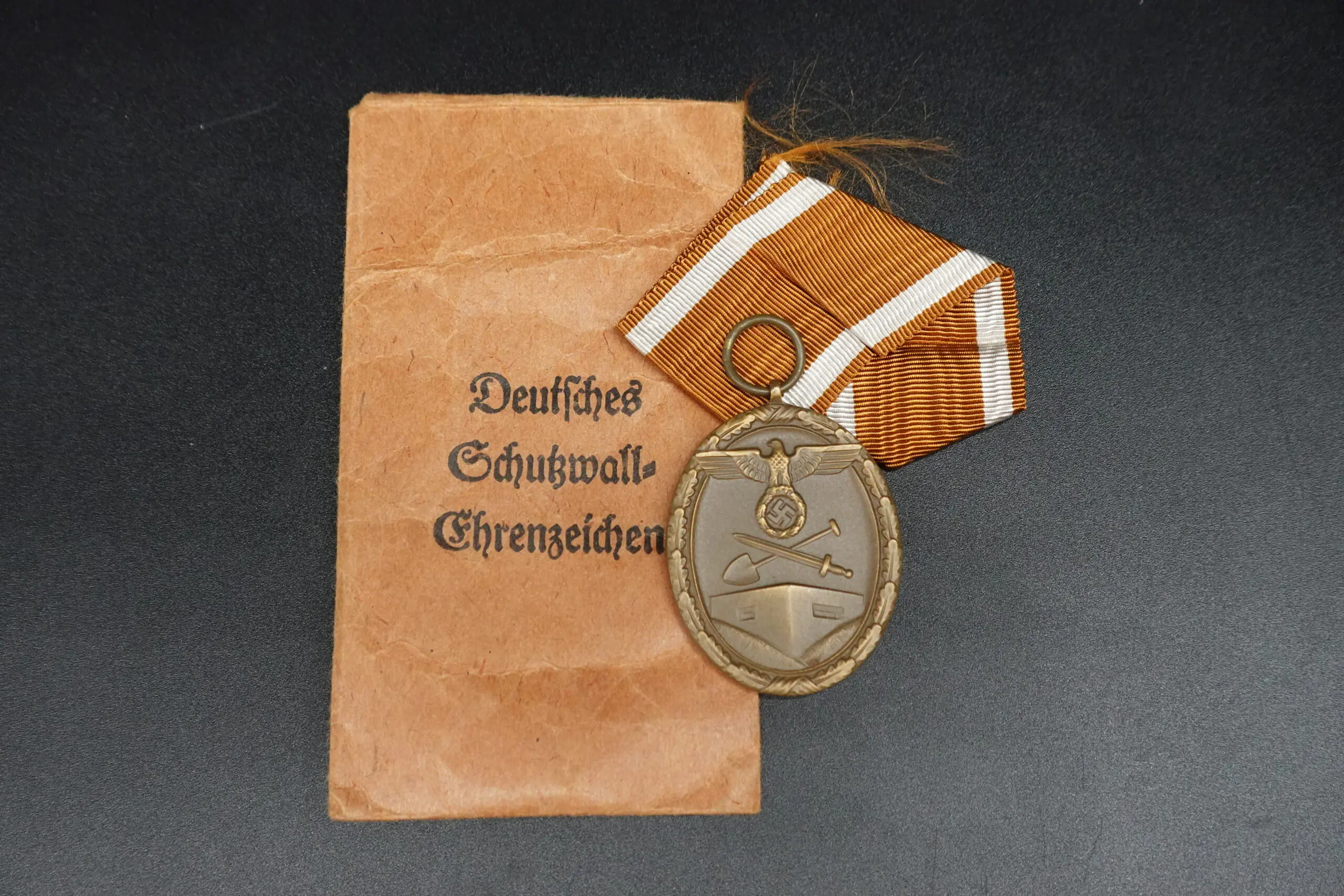Deutsches Schutzwall-Ehrenzeichen (“Westwall Medal”) with Josef Rössler Pouch - Image 1