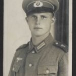 Studioportrait of Wehrmacht Soldier wearing "Eisenbahn-Panzerzüge V" Personnel Shoulderboards