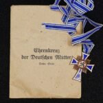 Mother’s Cross in Bronze (Ehrenkreuz der Deutschen Mutter in Bronze) + Award Pouch – G. Danner, Mühlhausen