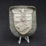 Crimea Shield (Krimschild), 1941–1942 – Zinc with Field-Grey Wool Backing